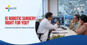 Indian surgeon discussing robotic surgery options with a patient and family at Health1 Hospital, Ahmedabad
